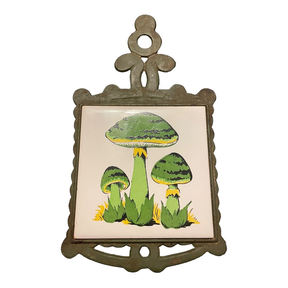 70’s green mushroom trivet in green iron frame/handle.
